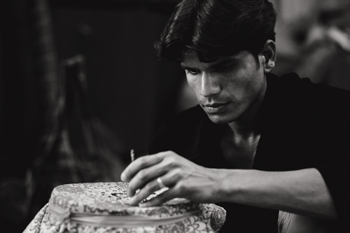 A textile worker in factory somewhere in New Delhi, India