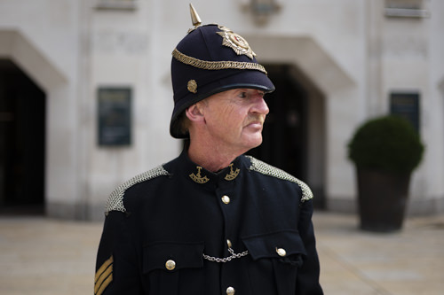 Tom in a traditional policeman's uniform, London